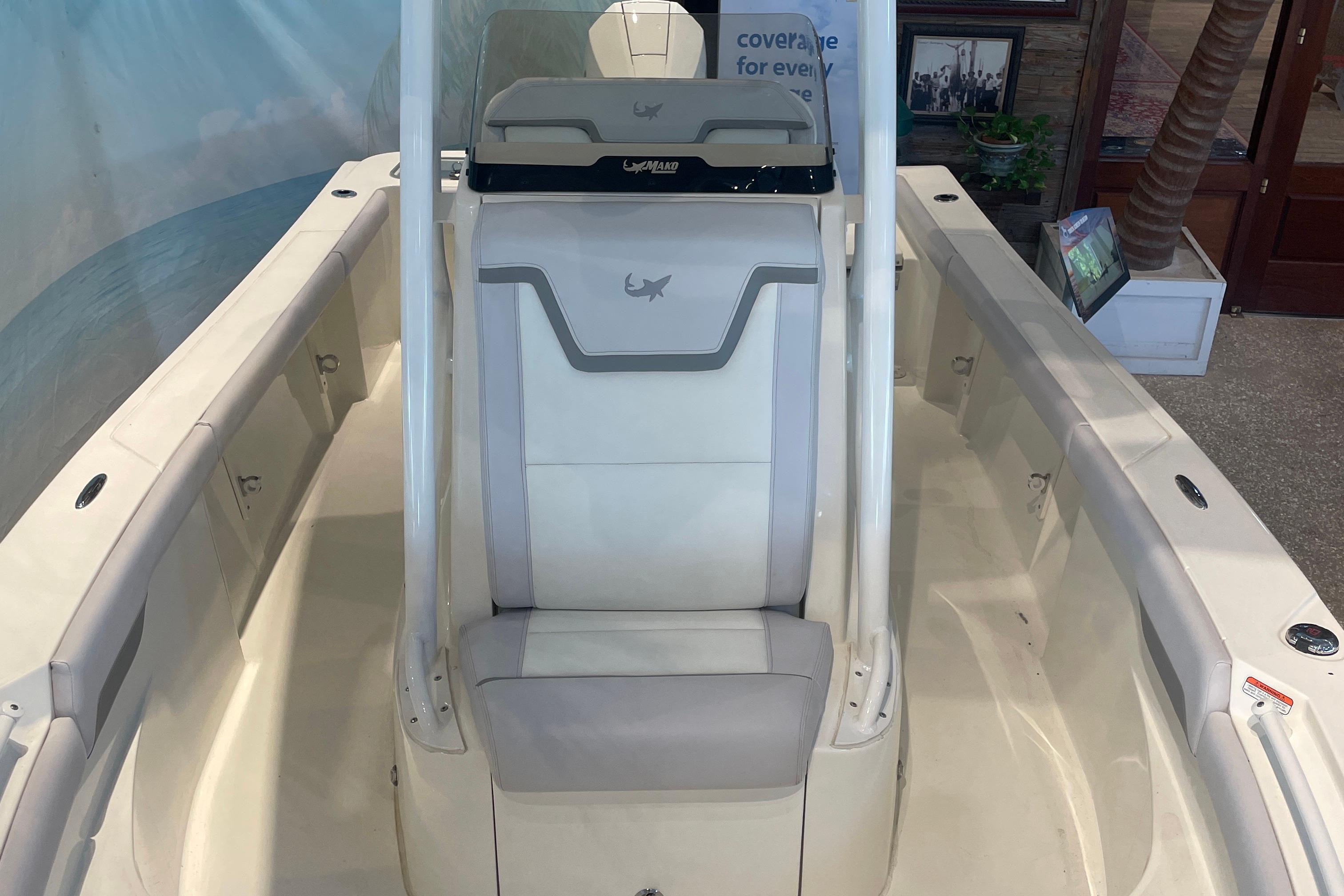 2026 Mako 226 Center Console boat interior with sleek seating and storage compartments.