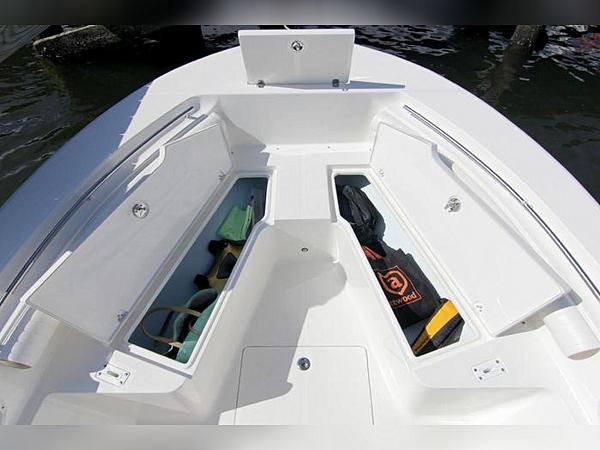 2023 Sea Born LX22 Center Console boat with open storage compartments.