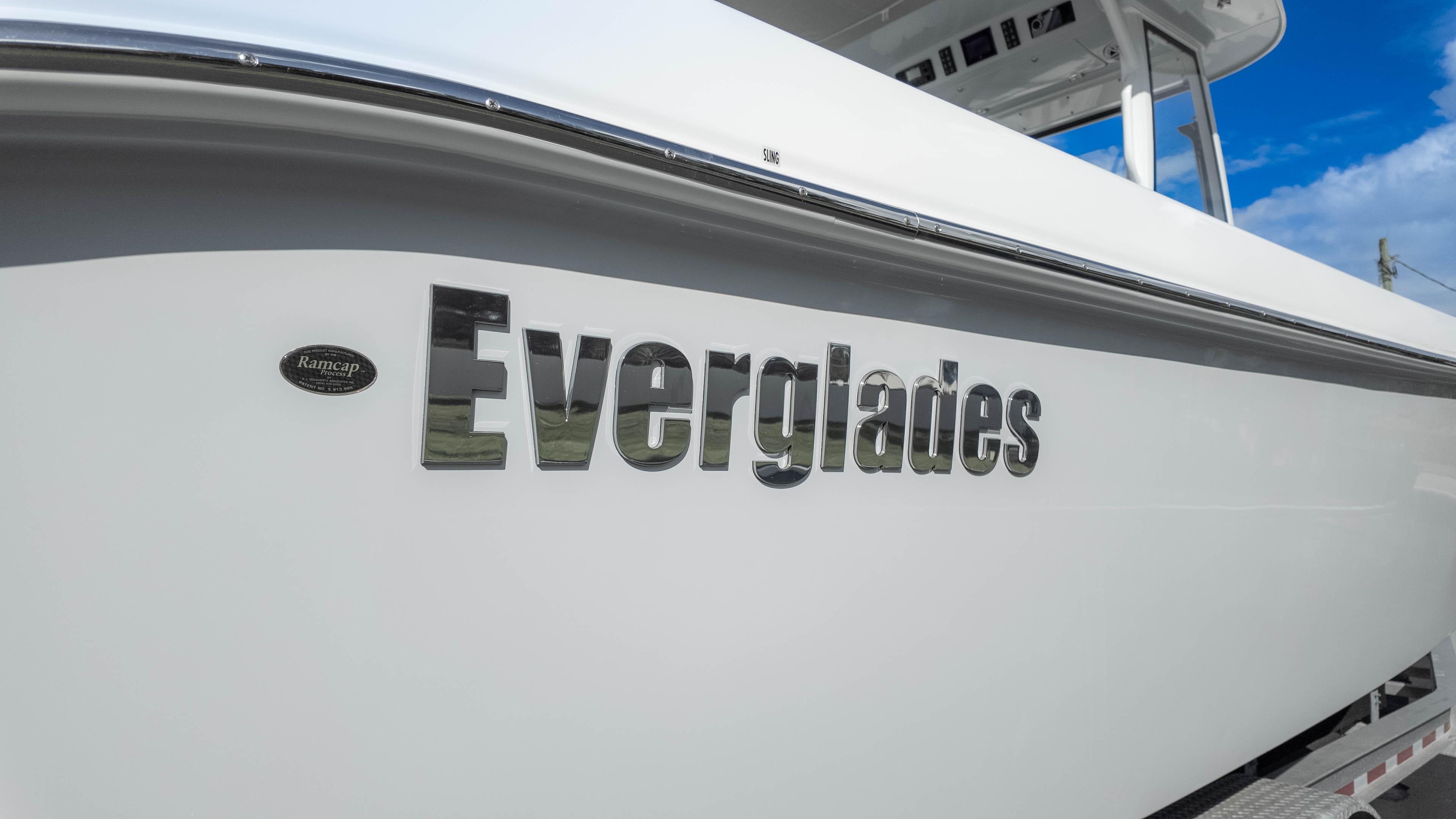 2025 Everglades 315 Center Console boat with sleek design and logo.