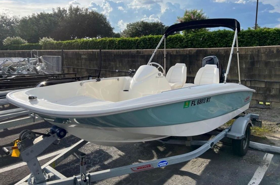 2018 Boston Whaler 150 Super Sport on trailer outdoors.
