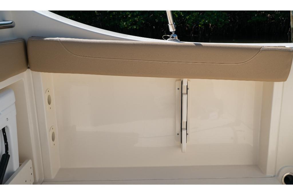 2023 Scout 240 Dorado boat interior detail with beige upholstery.