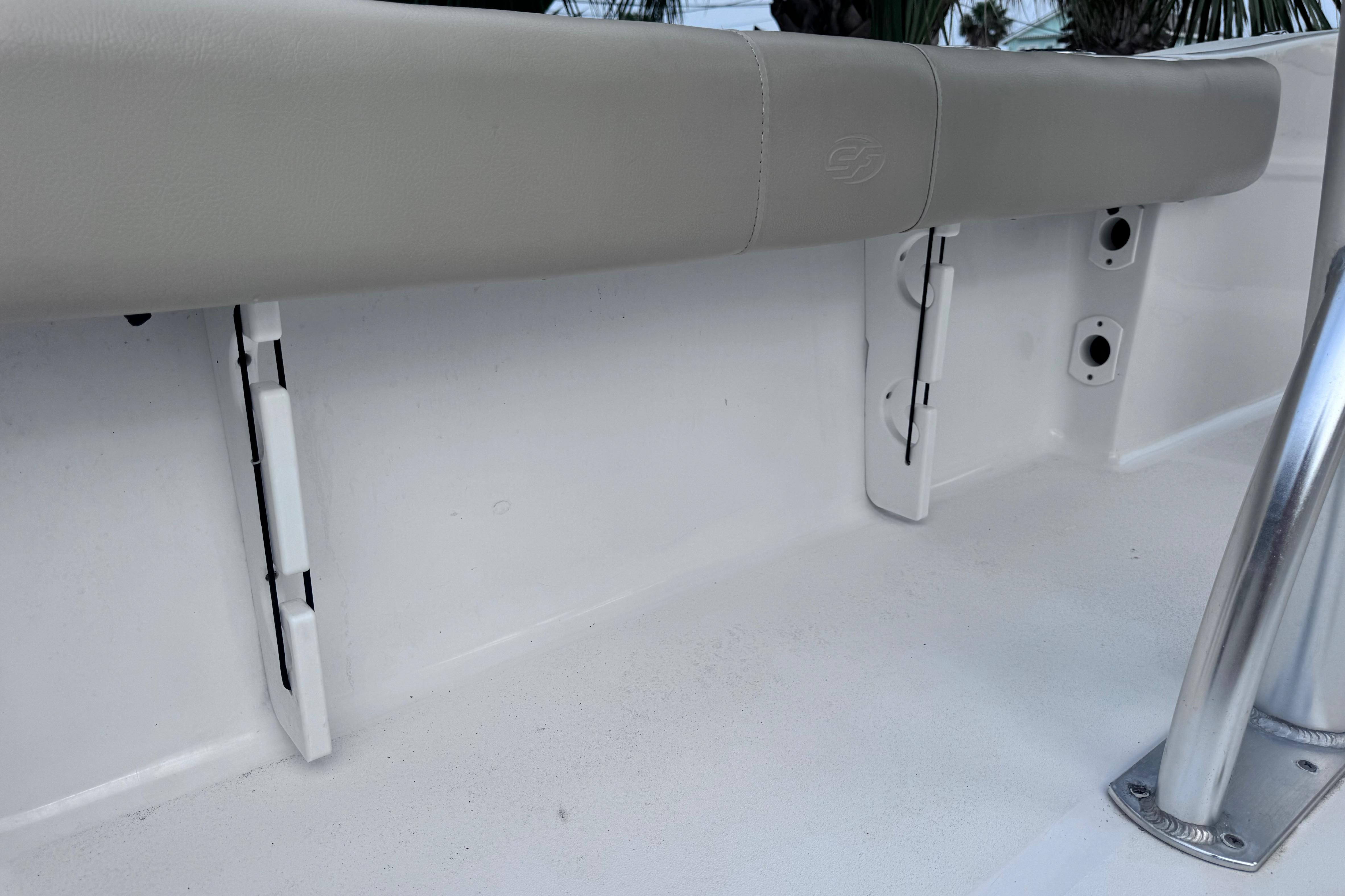2018 Sea Fox 206 Commander boat interior detail with cushioned seating and stainless steel support.
