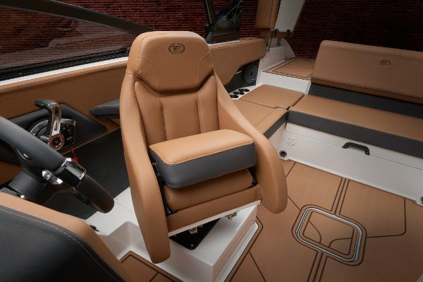 Luxurious interior of 2025 Cobalt CS23 boat with tan leather seating.