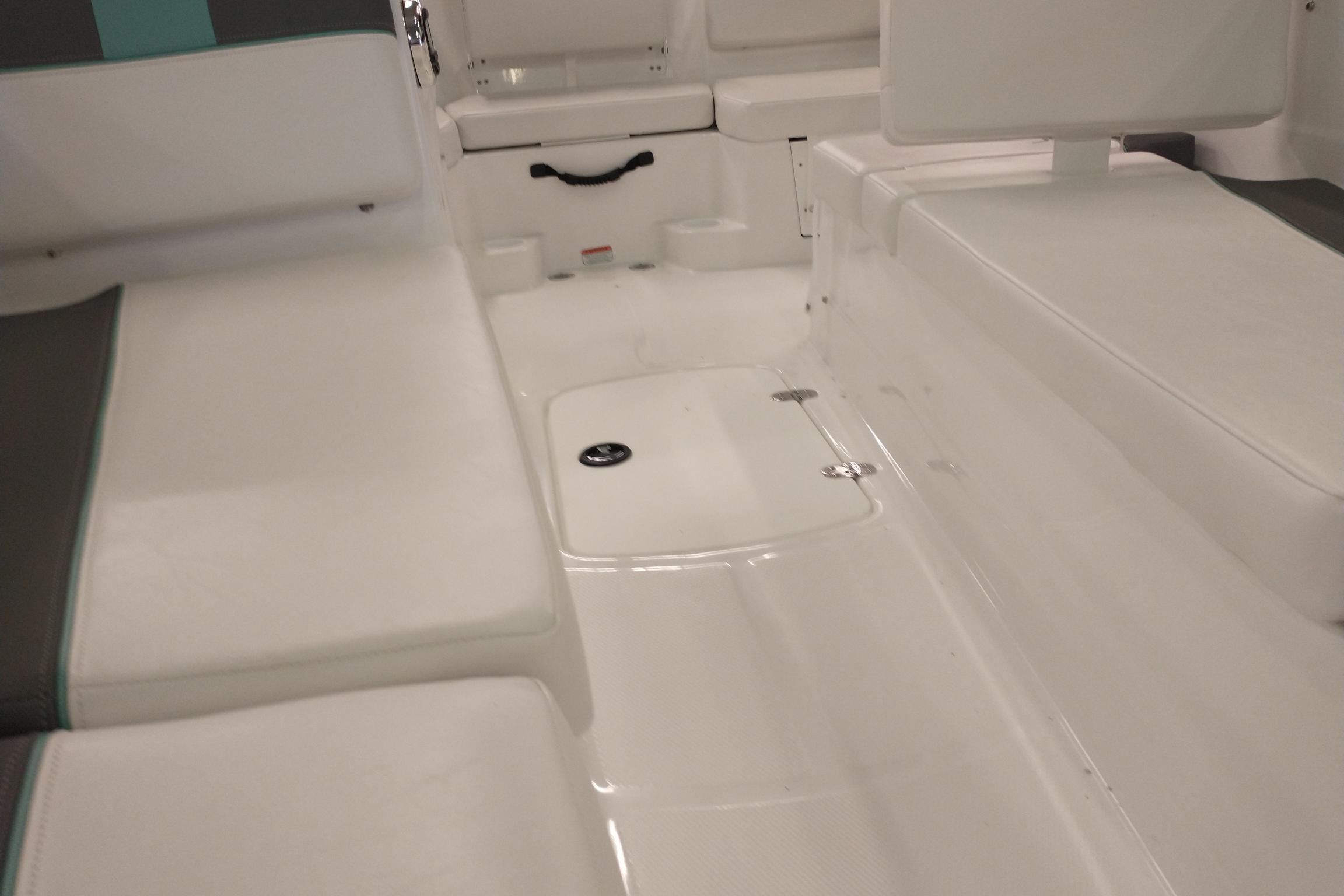 Interior seating of 2026 Tahoe T16 boat, featuring white and gray upholstery.
