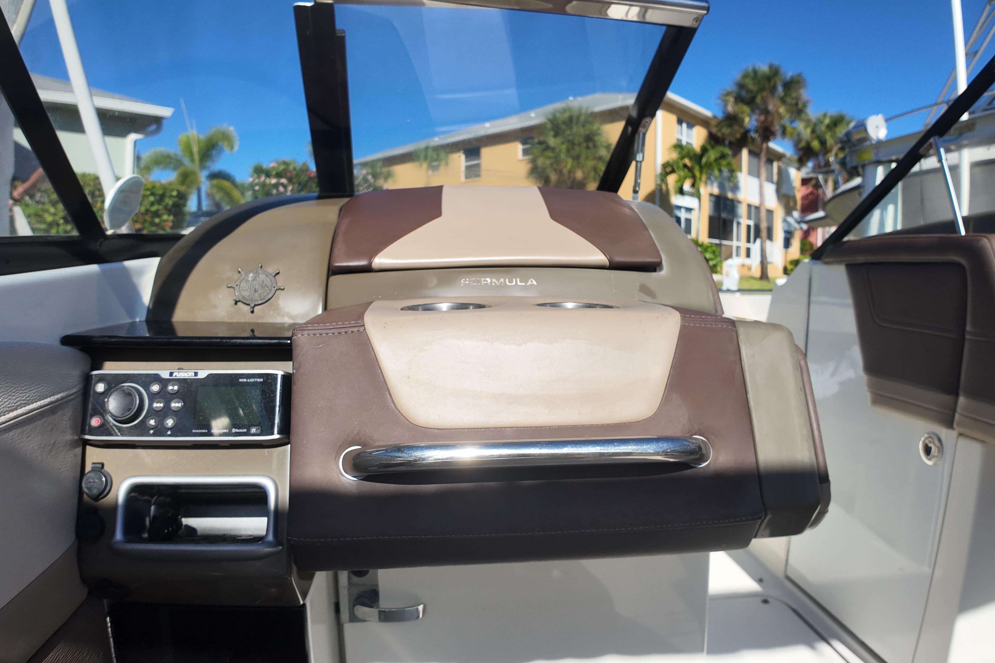 2014 Formula 240 Bowrider dashboard with control panel and steering wheel.