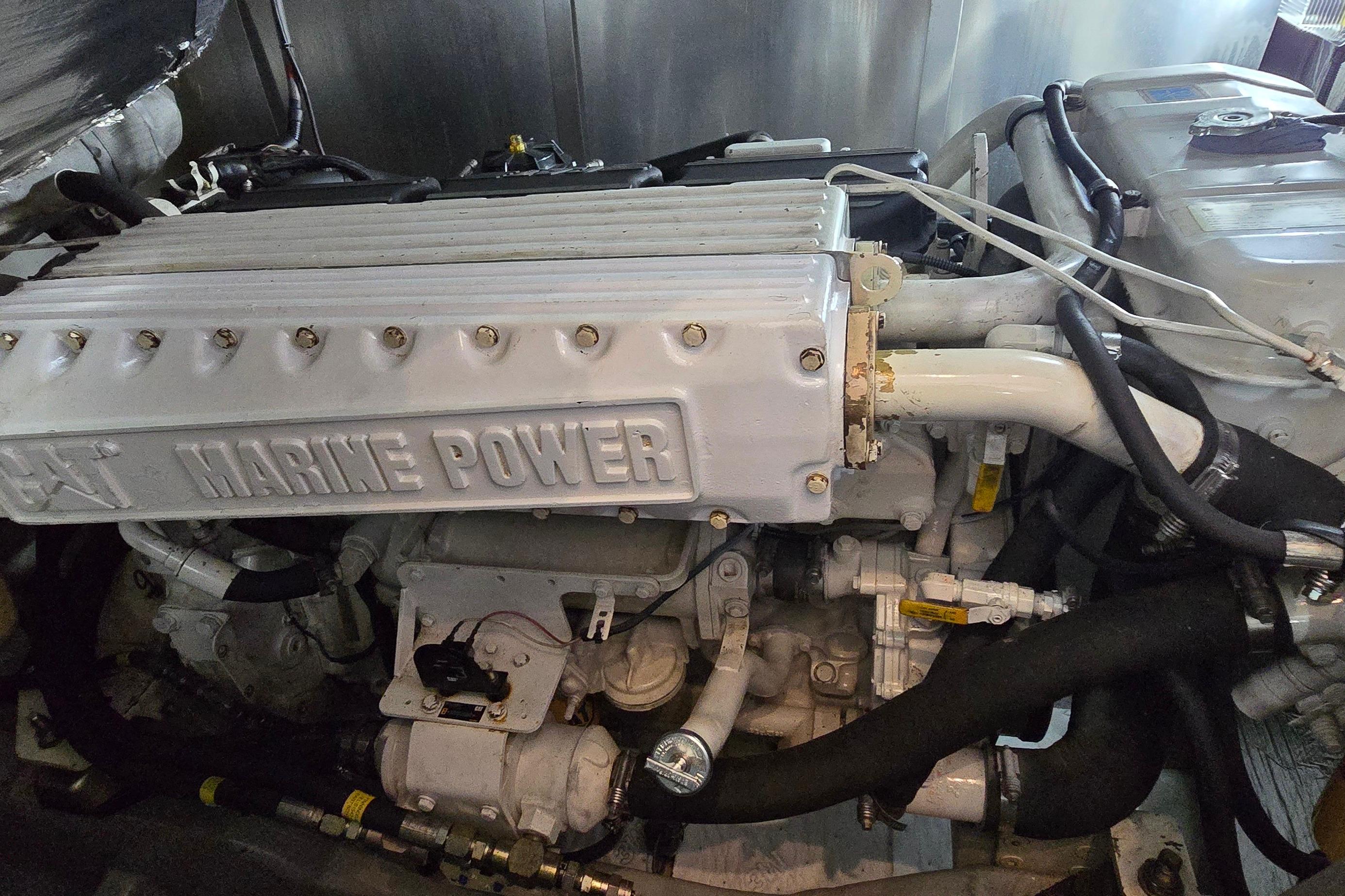 Engine of a 2004 Sunseeker Camargue 50 yacht, featuring CAT Marine Power.