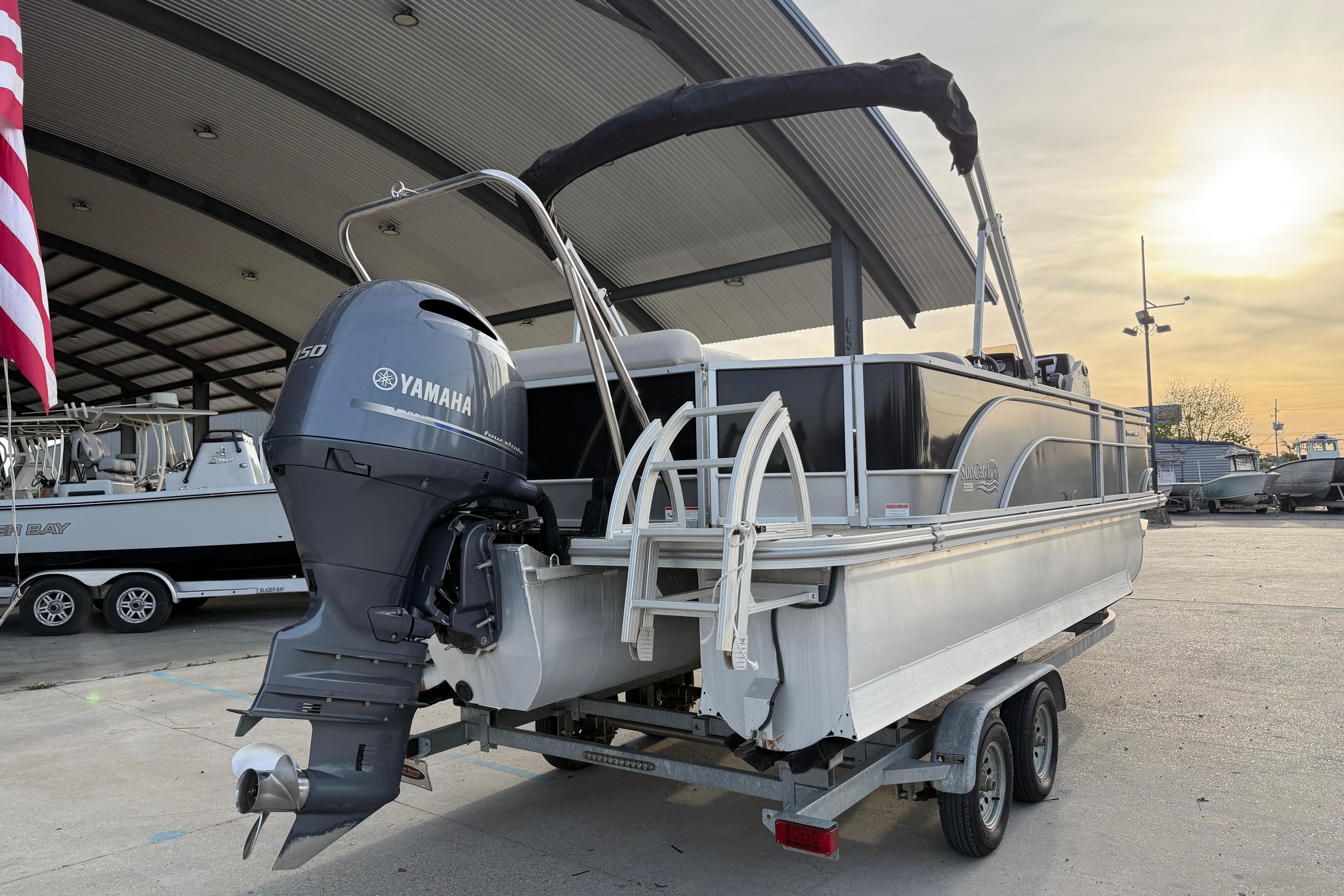 2022 Custom G3 Suncatcher 322FC pontoon boat with Yamaha motor on trailer.
