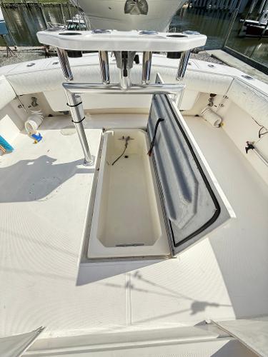 2001 Albemarle 280 Express Sport Fisherman deck with open storage compartment.