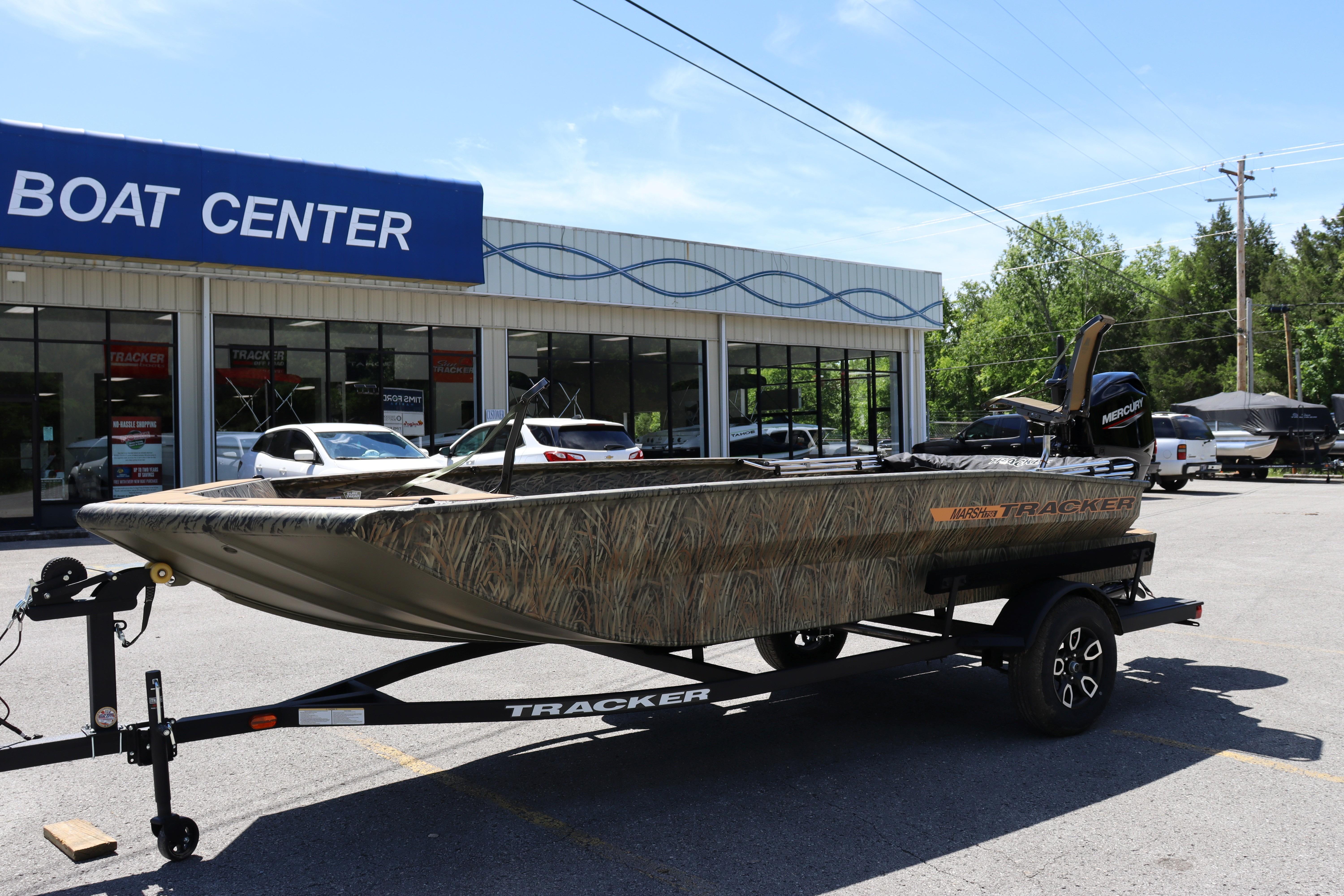 2026 Tracker Grizzly 1756 T Marsh boat displayed at a boat center.