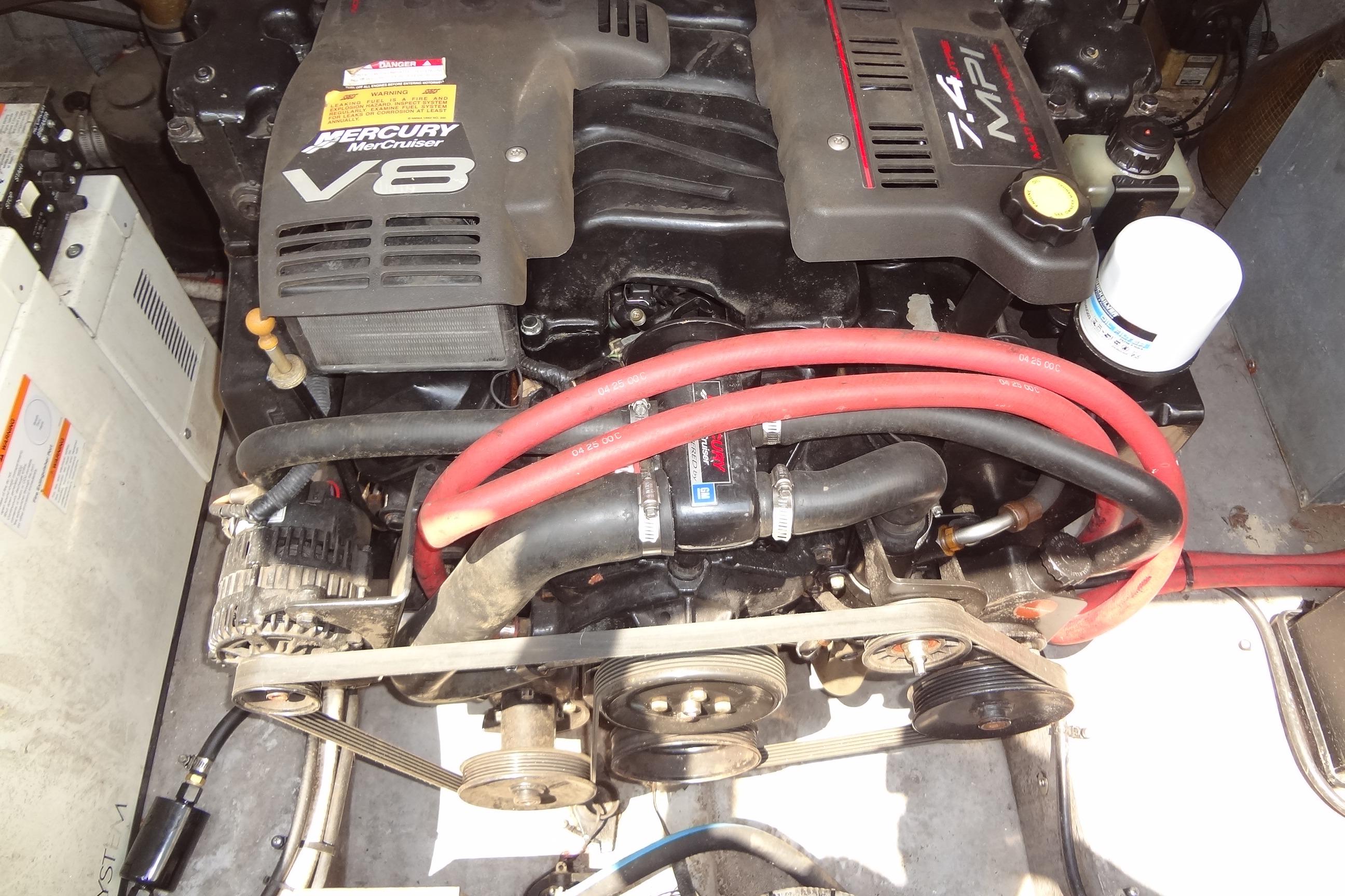 Engine compartment of a 2000 Chaparral Signature 260 with Mercury MerCruiser V8 engine.