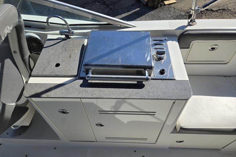 Outdoor kitchen area on a 2011 Sea Ray 300 Sundeck boat.