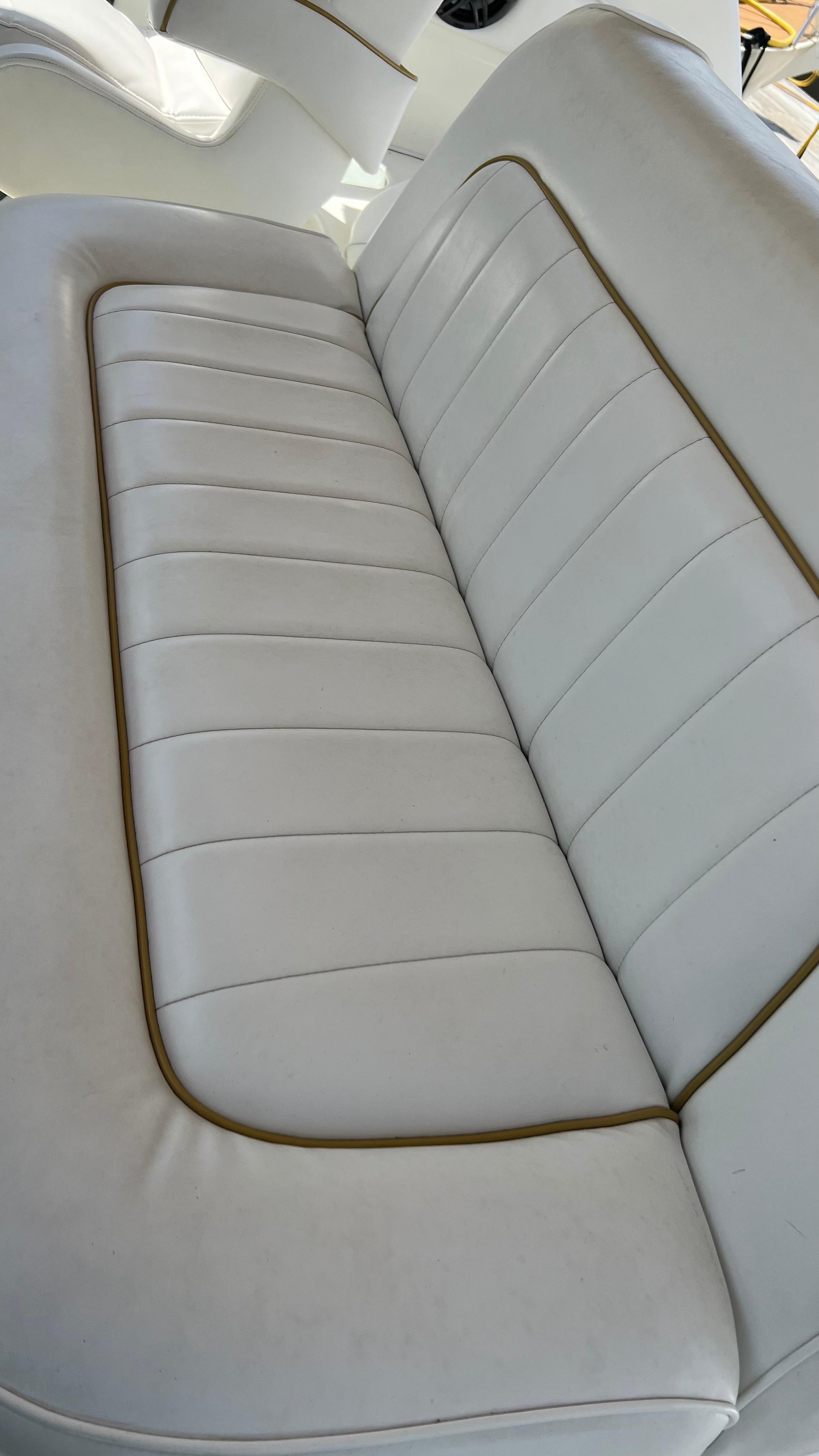 White leather seating on a 1997 Sea Ray 400 boat.