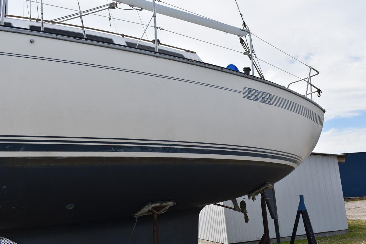 1987 S2 9.2A sailboat on a stand on land.