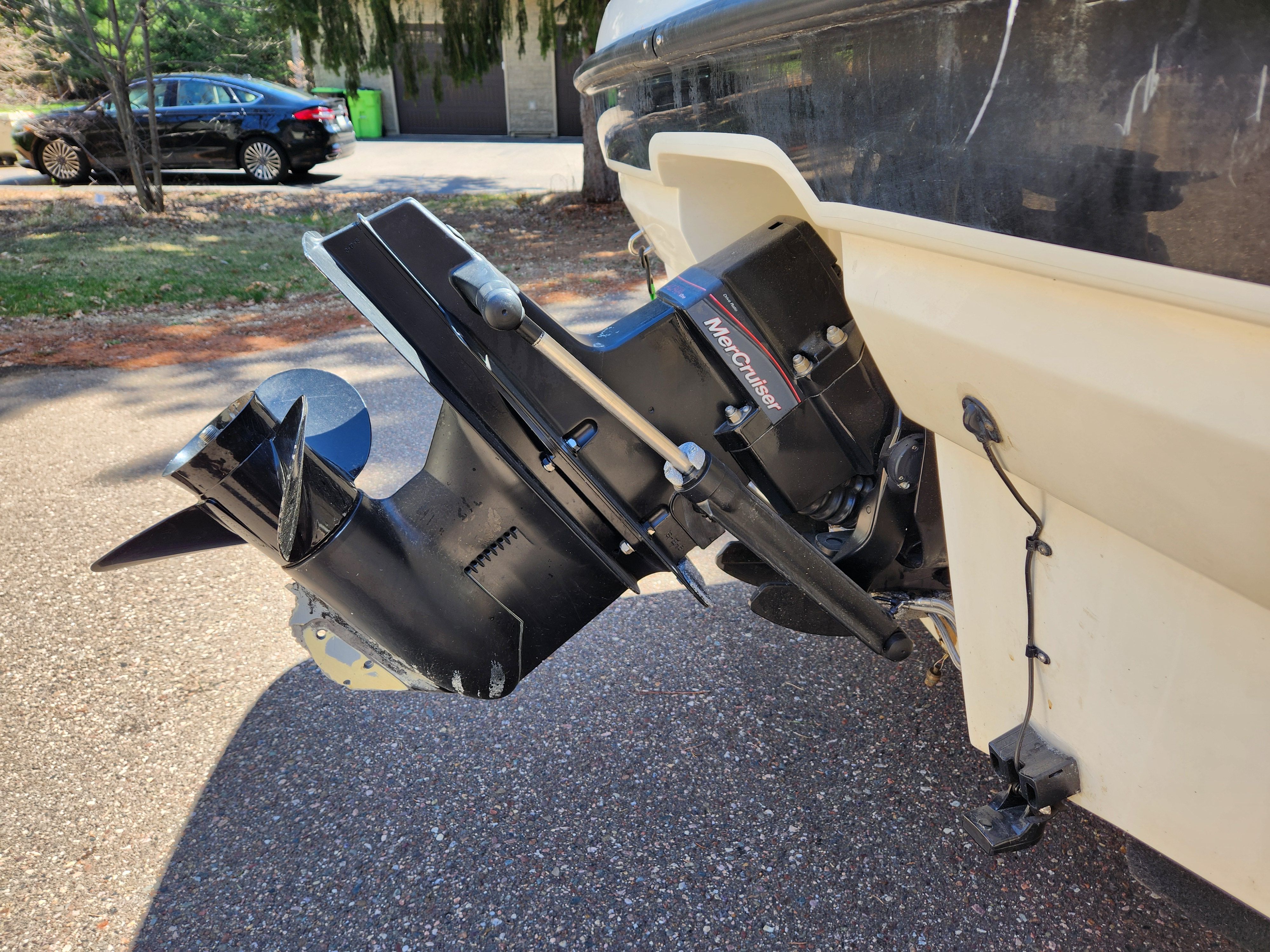 Close-up of an outboard motor on a 2009 Bayliner 194SF boat.