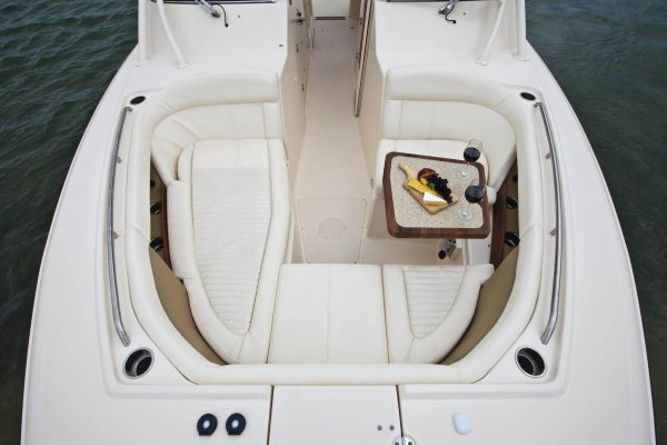 Manufacturer Provided Image: 2014 Grady-White Freedom 335 boat interior with seating and table.