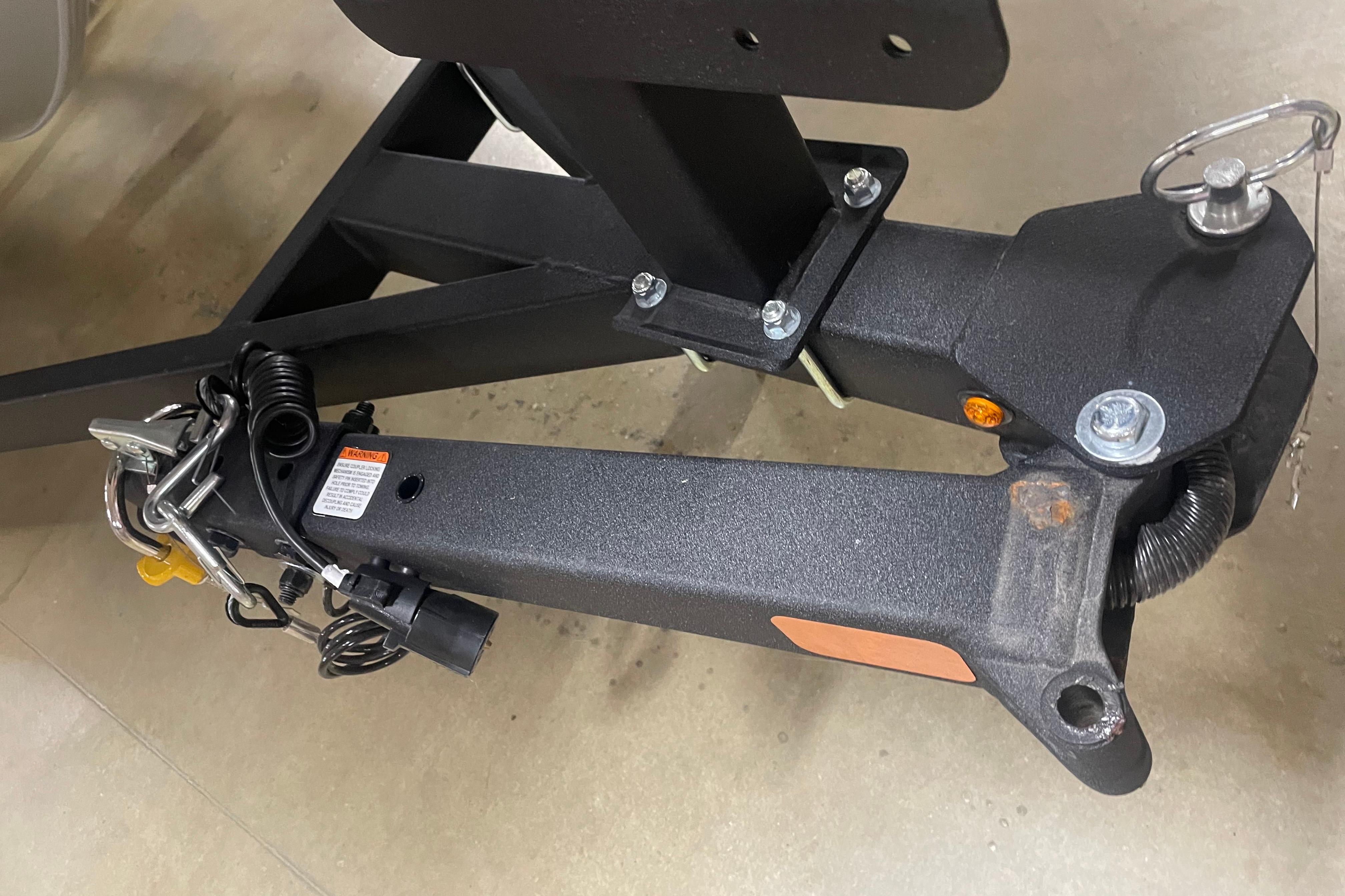 Trailer hitch of 2026 Tracker Pro Team 175 Crappie Edition boat, featuring secure locking mechanism.