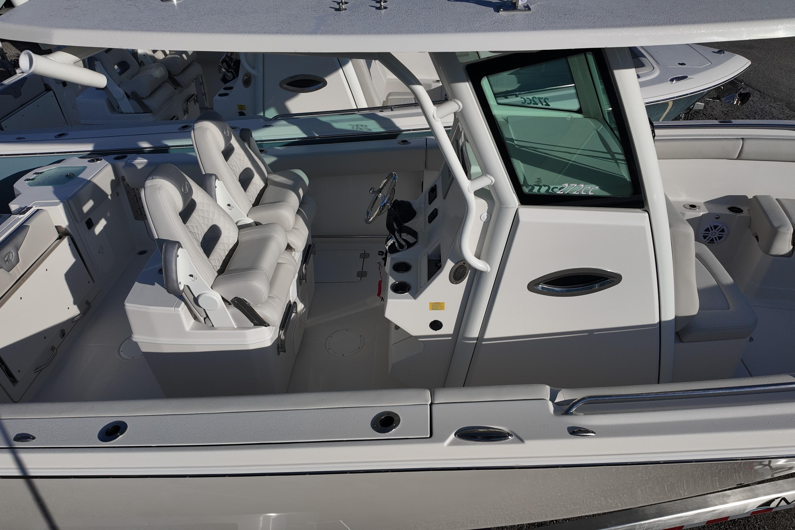 2026 Sailfish 272 CC boat interior with dual captain's chairs and modern helm.