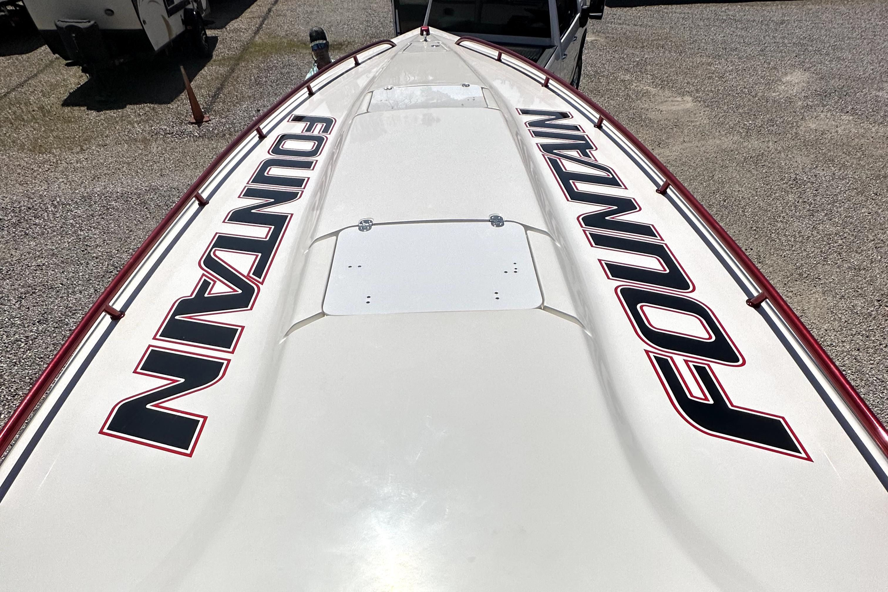2003 Fountain 38 Lightning boat deck with logo.