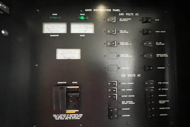 Main distribution panel of 2016 Sea Ray Sundancer 510 yacht, featuring 240V and 120V AC controls.