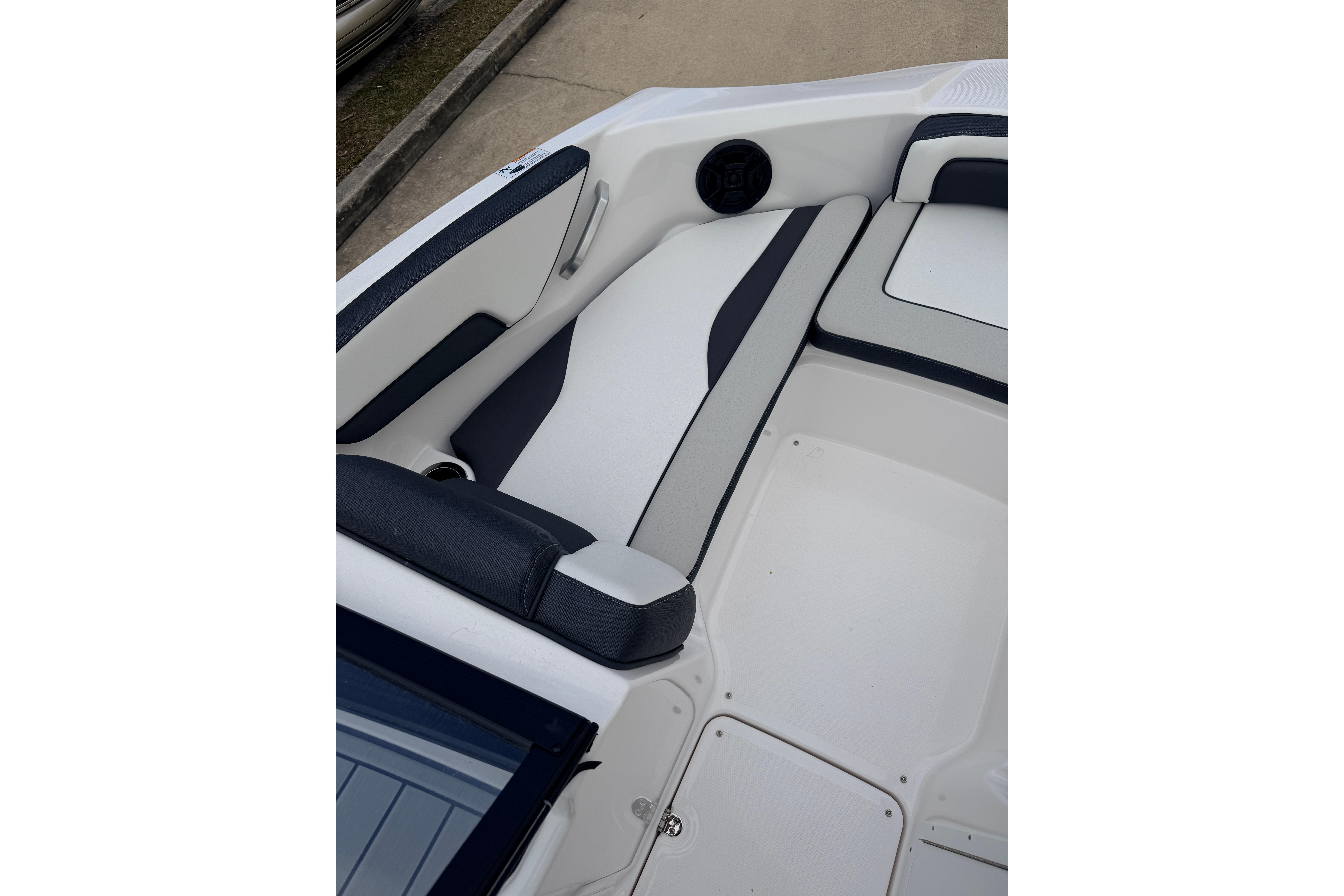 2026 Yamaha Boats AR195 interior seating with sleek white and black design.