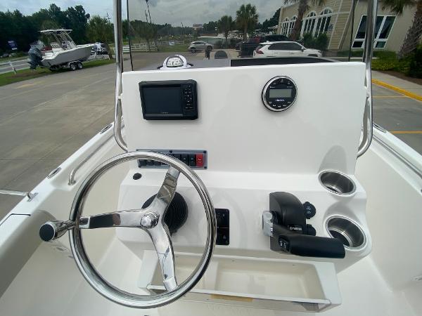 2024 Key West 189 FS boat console with steering wheel, electronics, and controls.