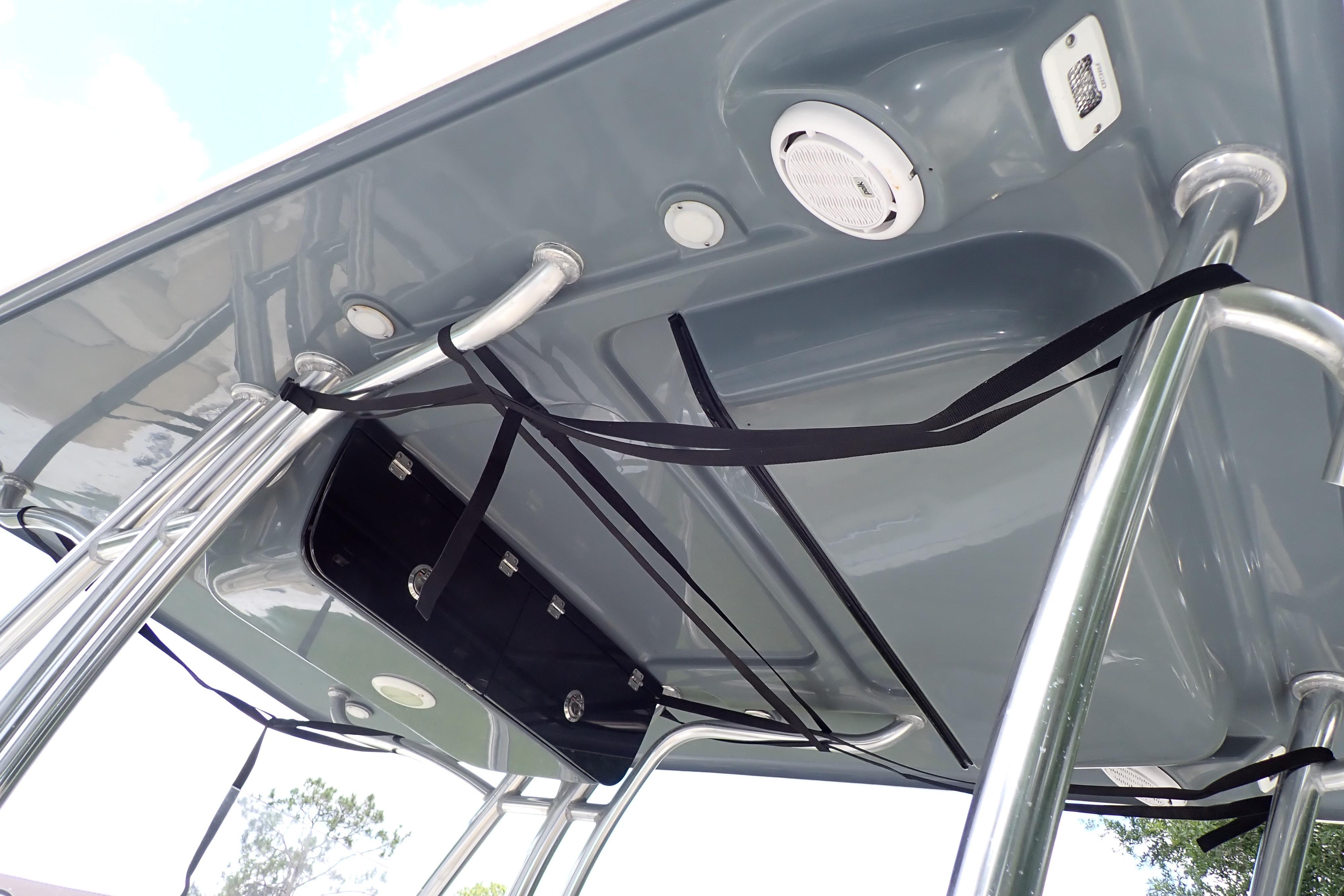2019 Key West 263 FS boat T-top with integrated speakers and storage straps.