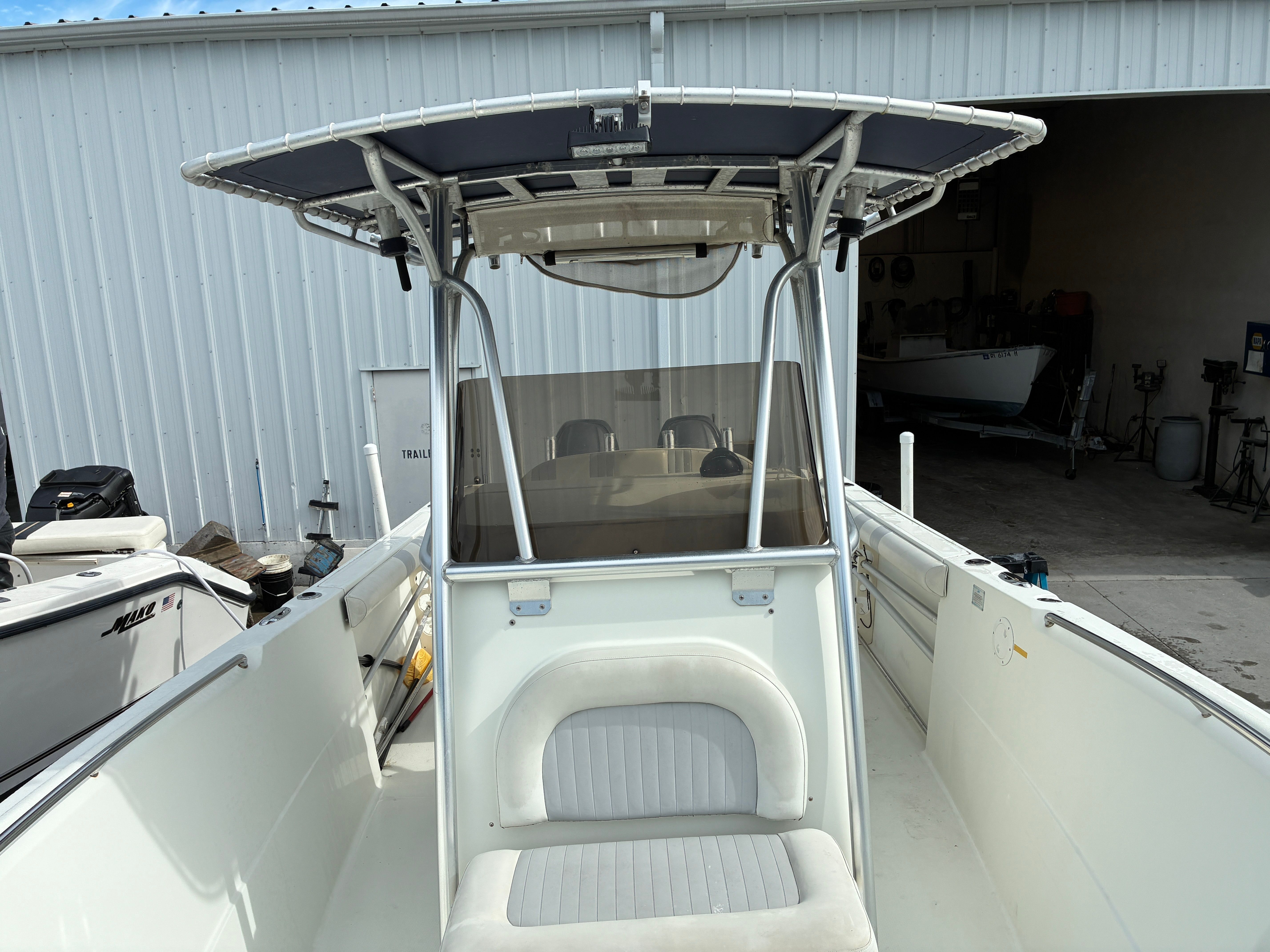2007 Sailfish 2660 boat parked in warehouse.