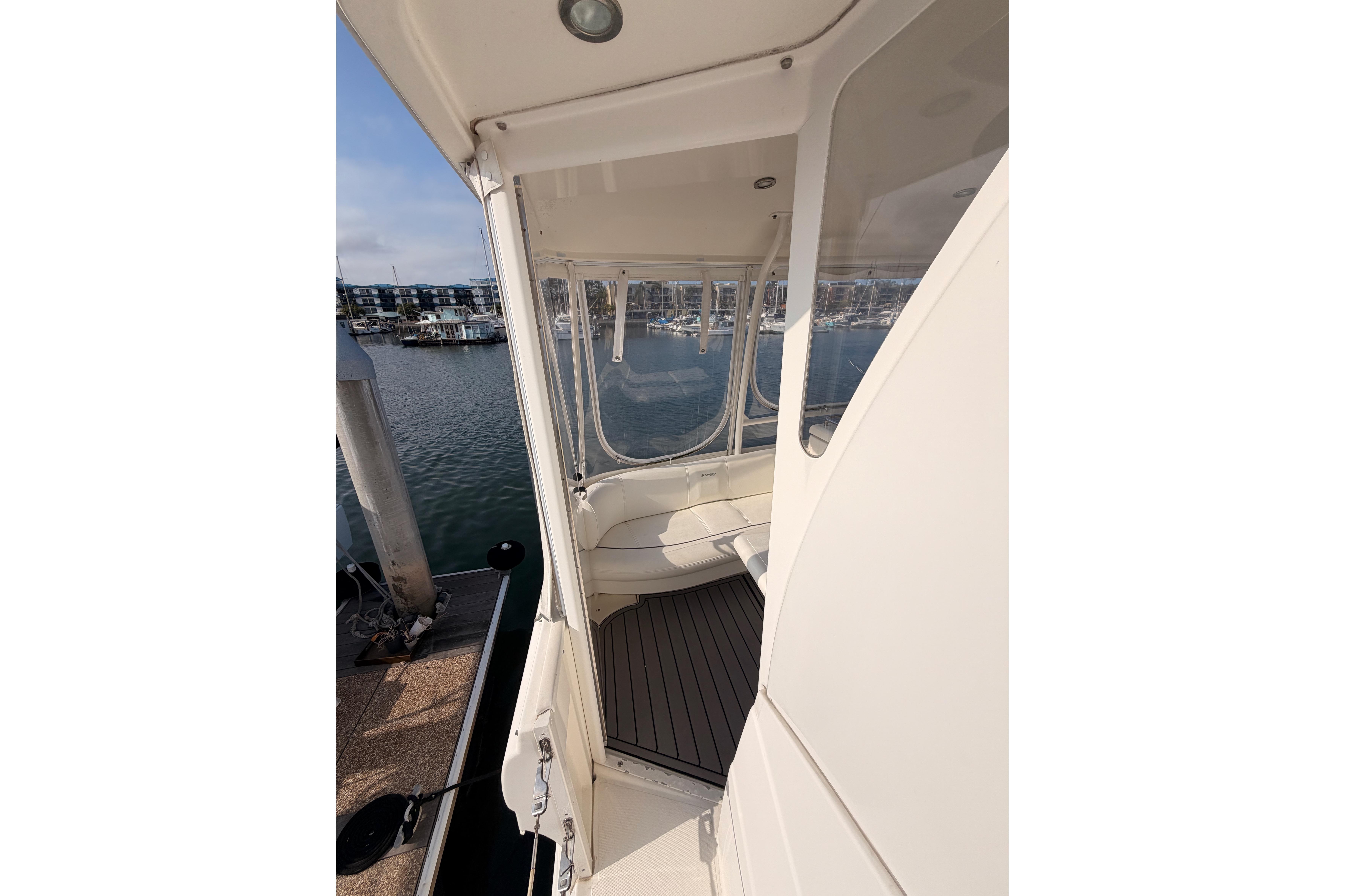 2005 Cruisers Yachts 405 Express Motoryacht docked, showcasing exterior and marina view.