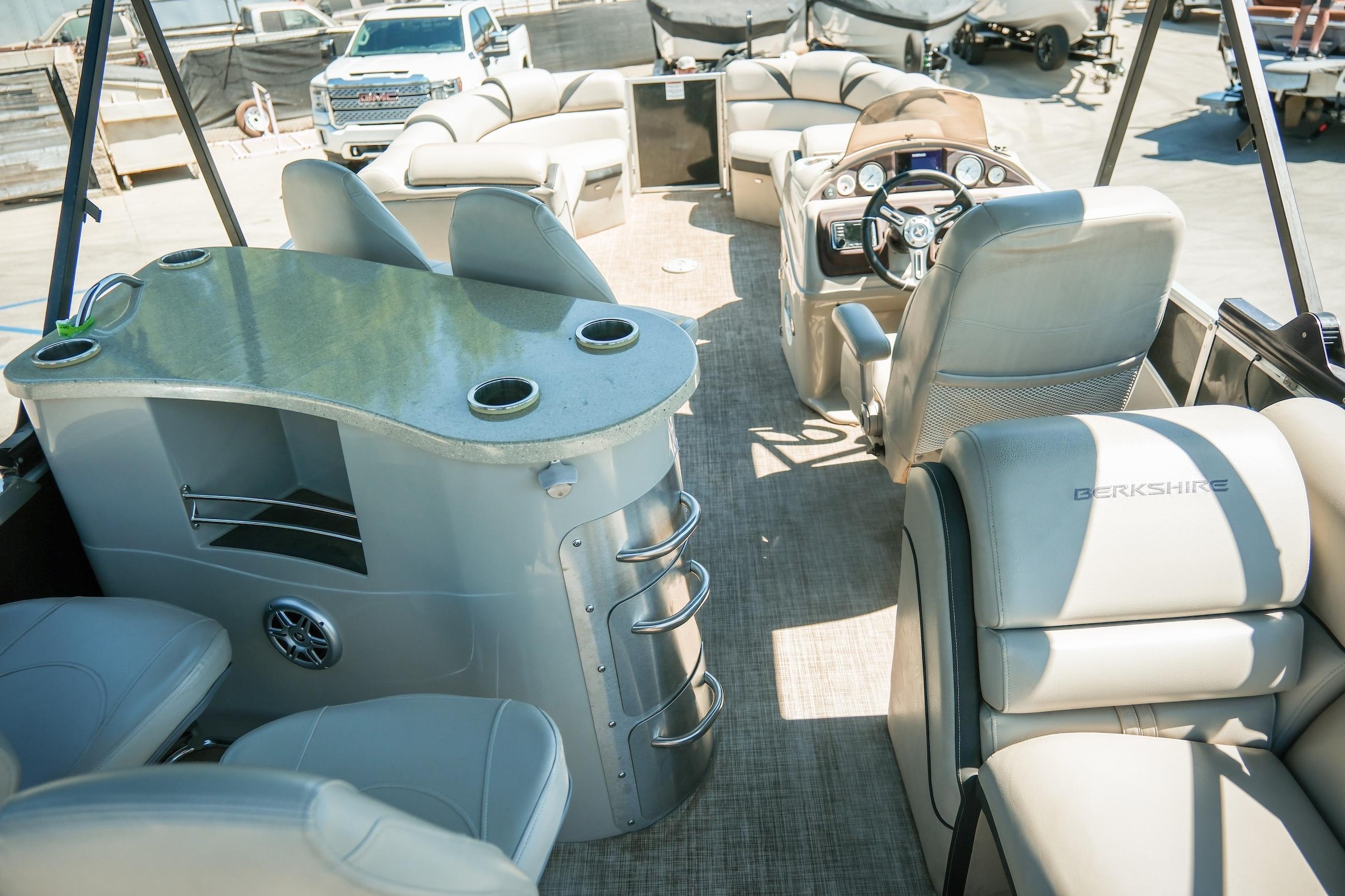 Interior of a 2019 Berkshire 25CLE STS pontoon boat with luxurious seating and helm.