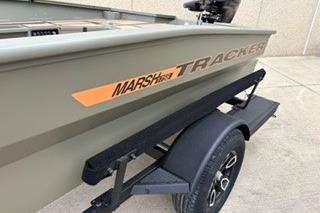 2026 Tracker Grizzly 1756 T Marsh boat on trailer, side view.
