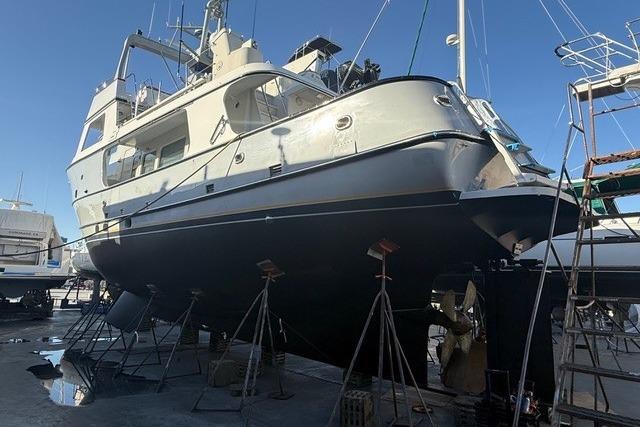 1990 Seaton Long Range Cruiser yacht on dry dock for maintenance.
