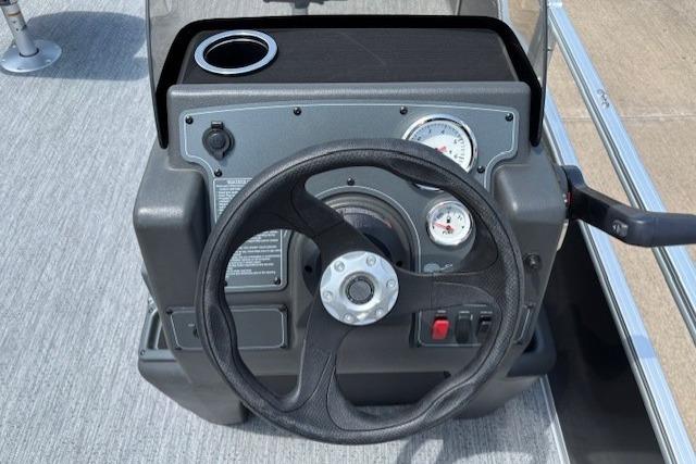 Steering console of 2026 Sun Tracker Bass Buggy 18 DLX pontoon boat.
