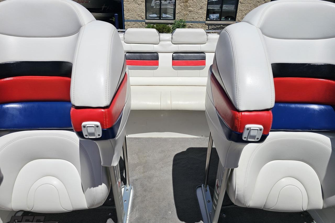 2005 Formula 271 FASTech boat interior with red, white, and blue seating.