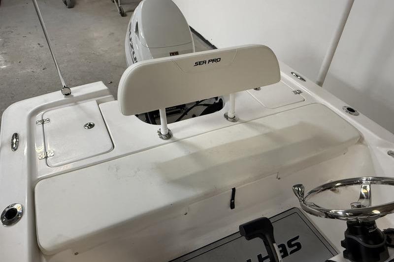 2026 Sea Pro 172 Bay boat interior with steering wheel and seating.