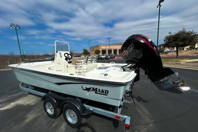 2026 Mako Pro Skiff 19 CC boat on trailer, outdoor display.