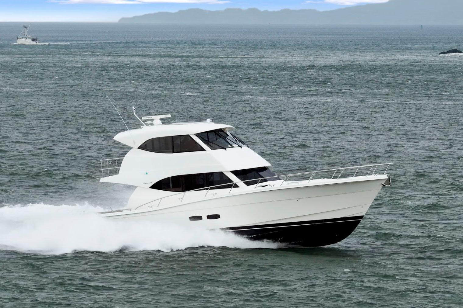 2014 Maritimo M50 yacht cruising on open water, showcasing sleek design and performance.