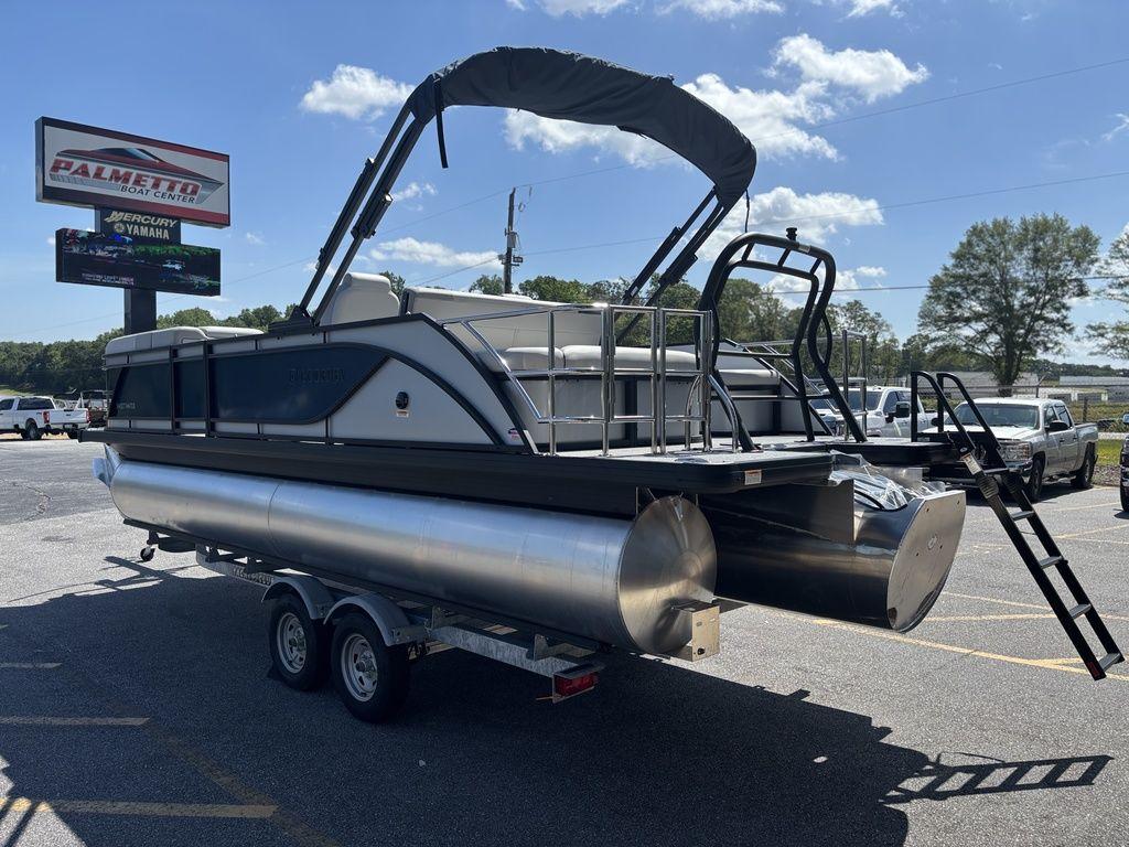 2026 Godfrey SWEETWATER 2286 SFL pontoon boat on trailer at dealership.