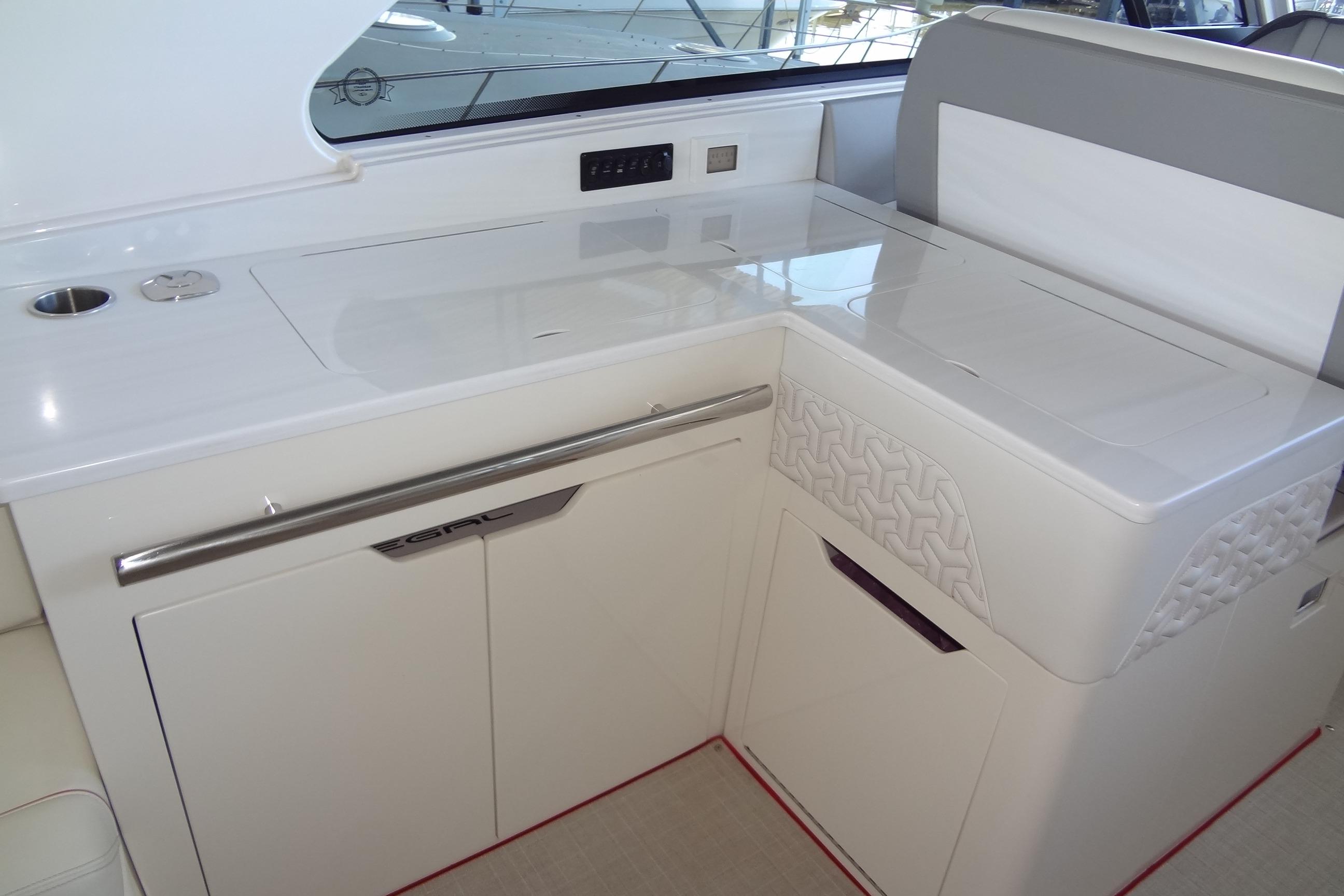 2022 Regal LS36 yacht interior with sleek white cabinetry and modern design.