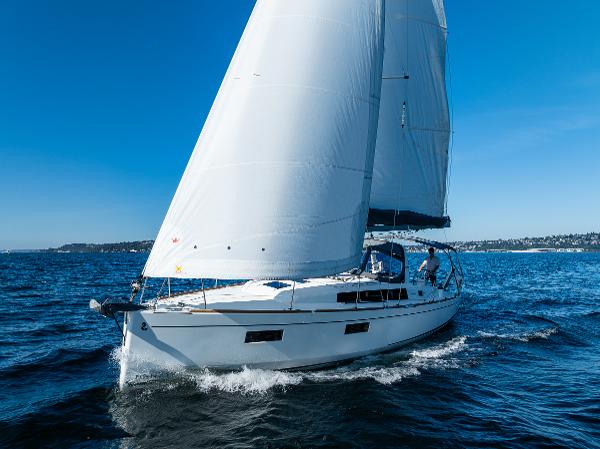 2021 Beneteau Oceanis 38.1 sailboat on open water.