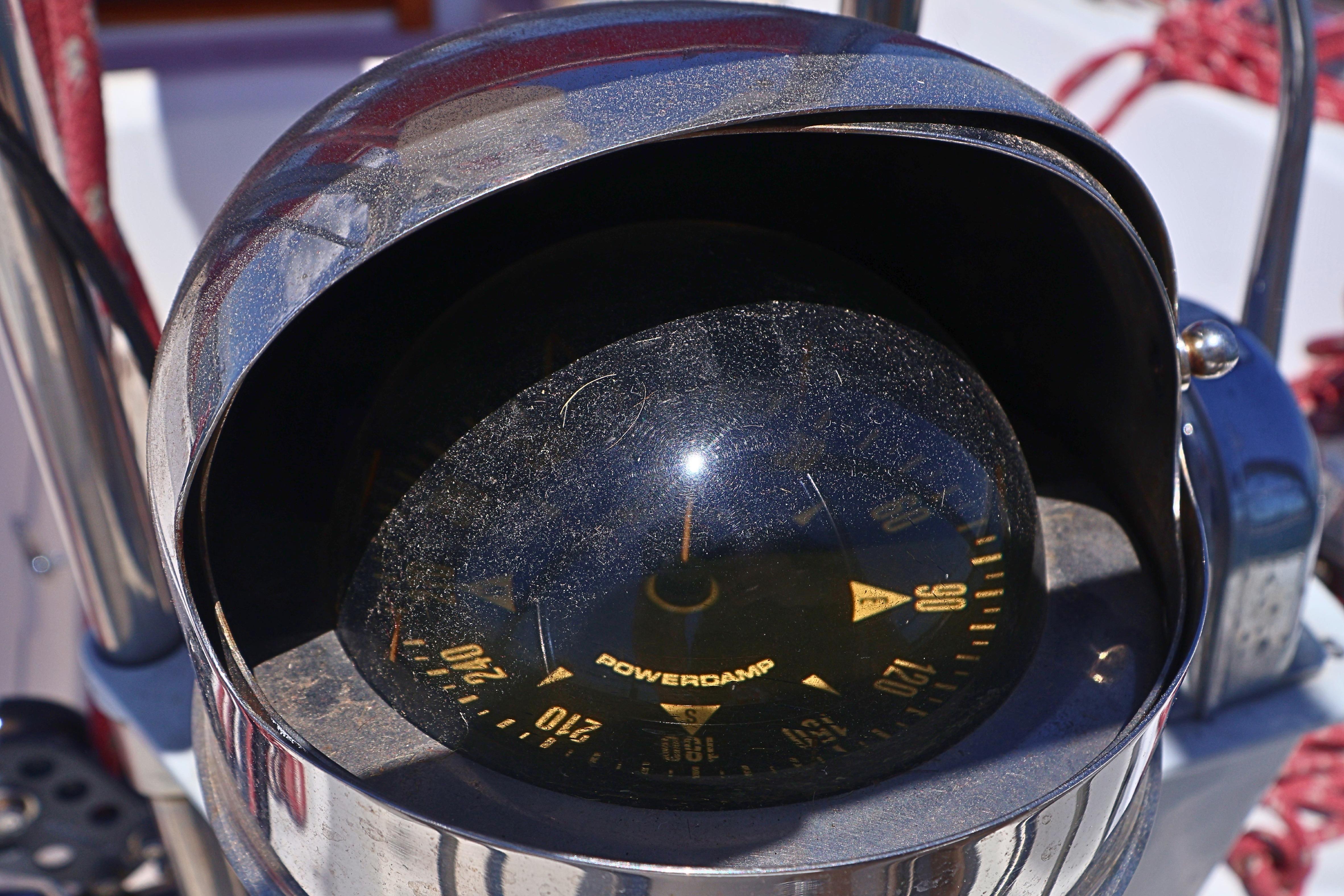 Close-up of a compass on a 1989 J Boat J 40 sailboat.