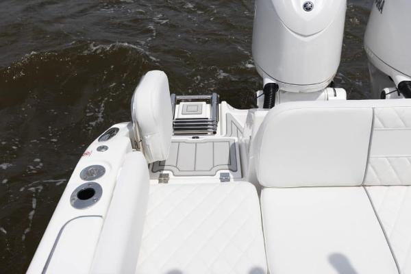 Manufacturer Provided Image: 2025 Sea Fox 268 Commander boat interior with white seating and dual engines.