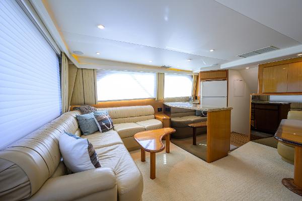 Luxurious interior of 2000 Viking 50 Convertible yacht with plush seating and modern amenities.