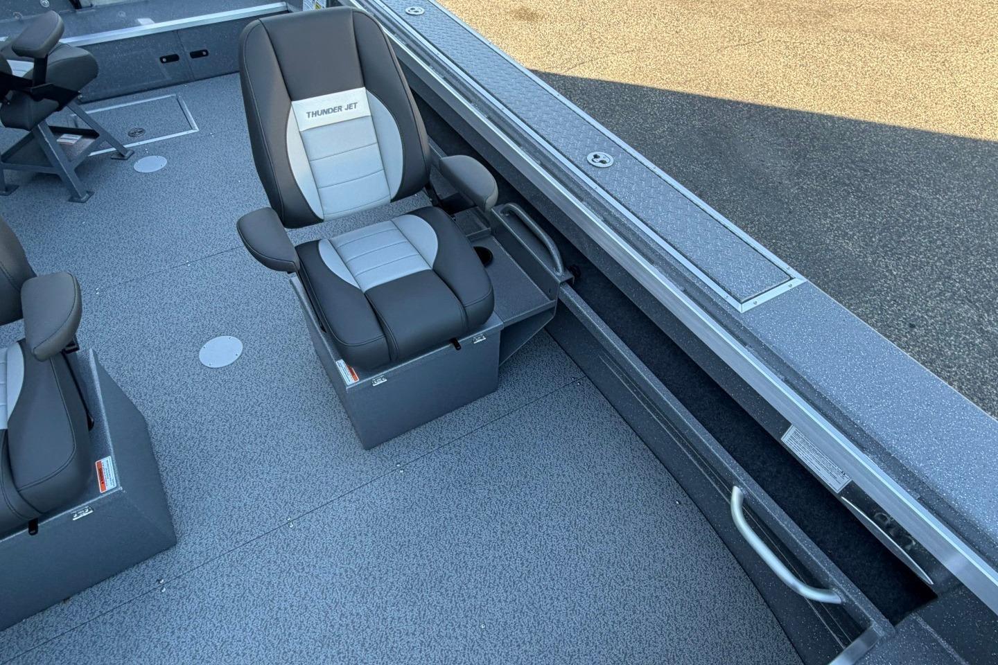 Interior of 2026 Thunder Jet 209 Rush OT boat with comfortable seating.