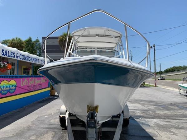 2008 Sea Fox 236WA Pro Series boat on trailer at sales and consignment shop.