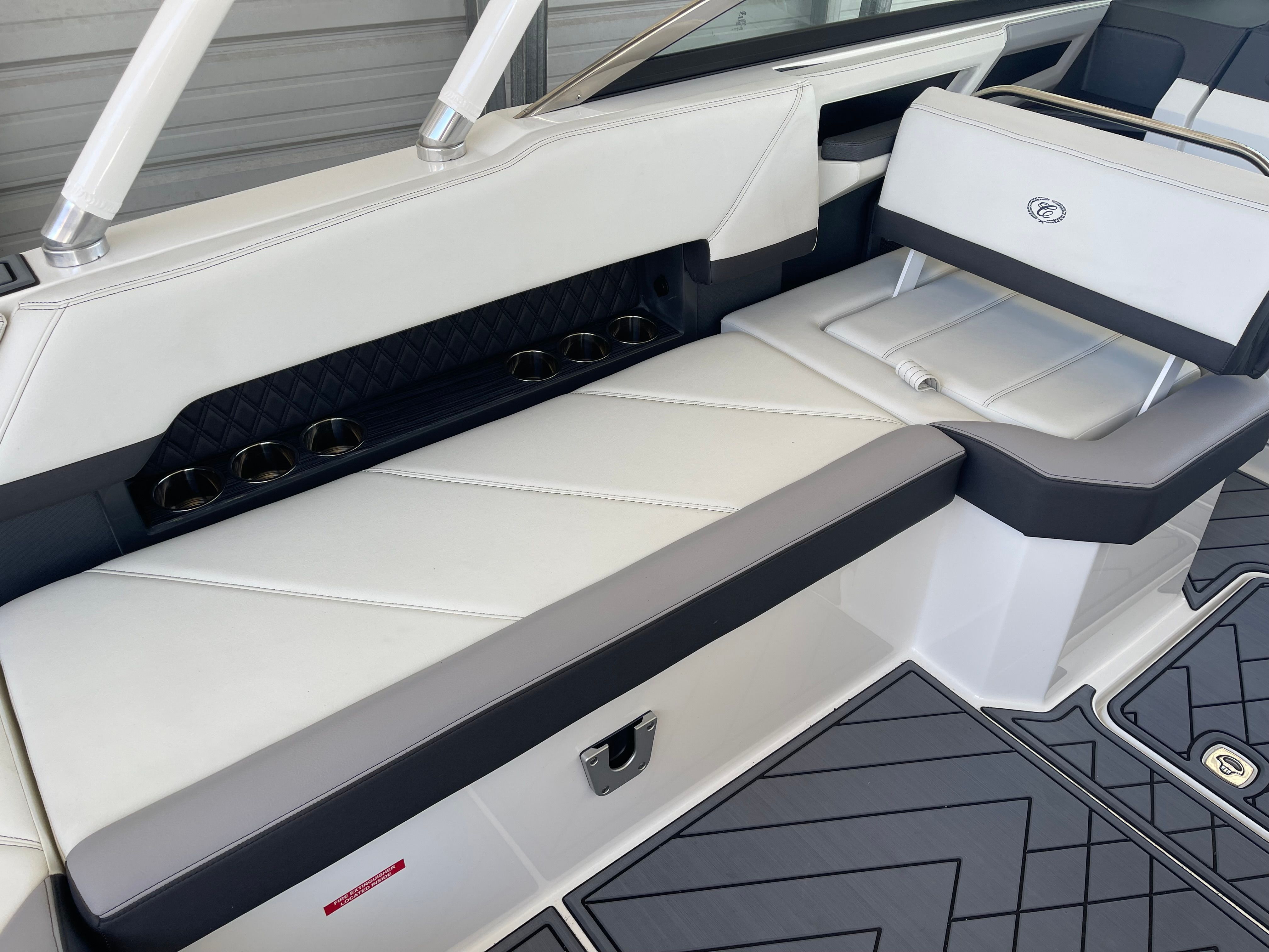 Interior of 2022 Cobalt R8 Outboard with luxurious white seating.
