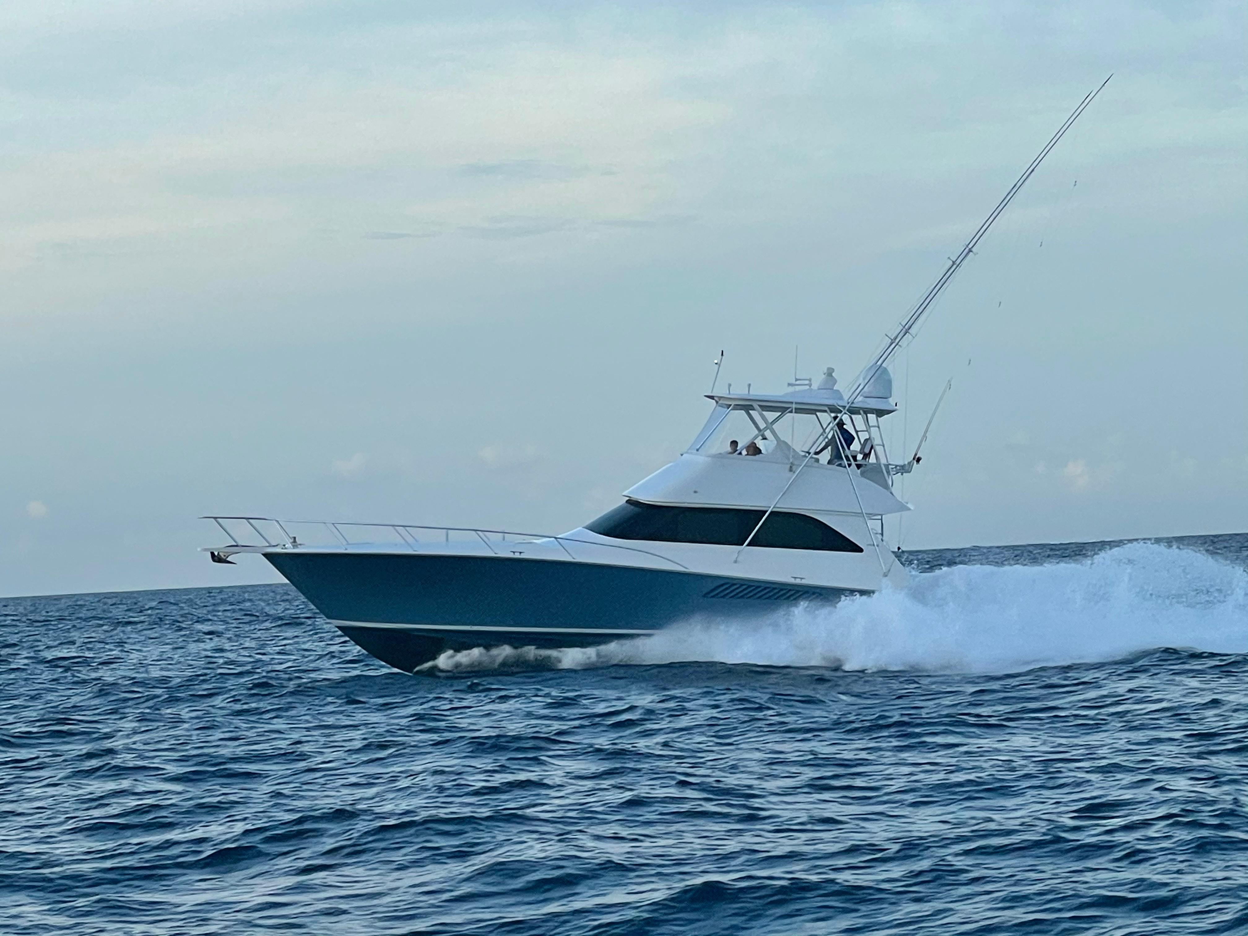 2007 Viking 52 Convertibles yacht cruising on open sea.