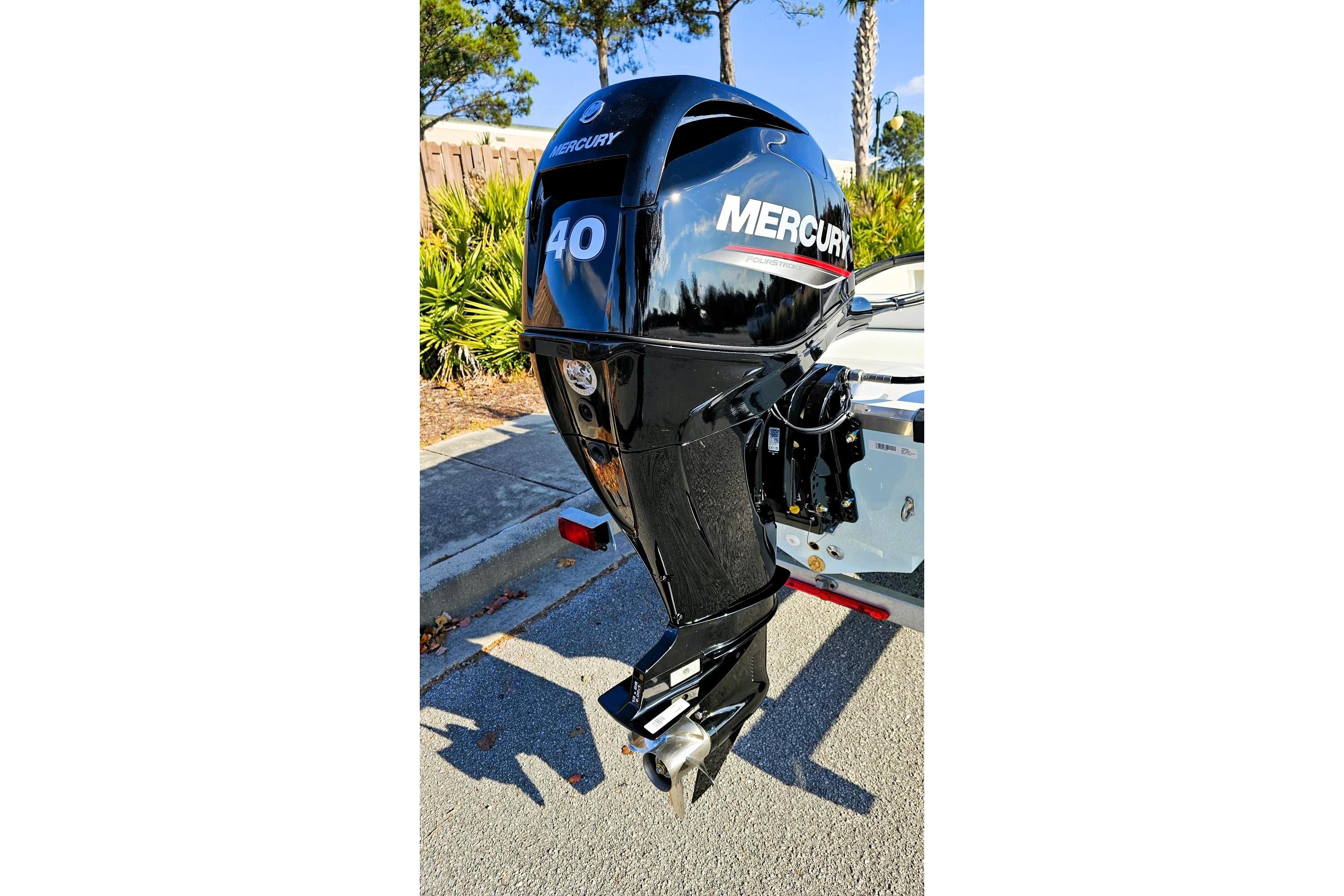 2026 Mako Pro Skiff 13 CC with Mercury 40 outboard motor in sunny outdoor setting.