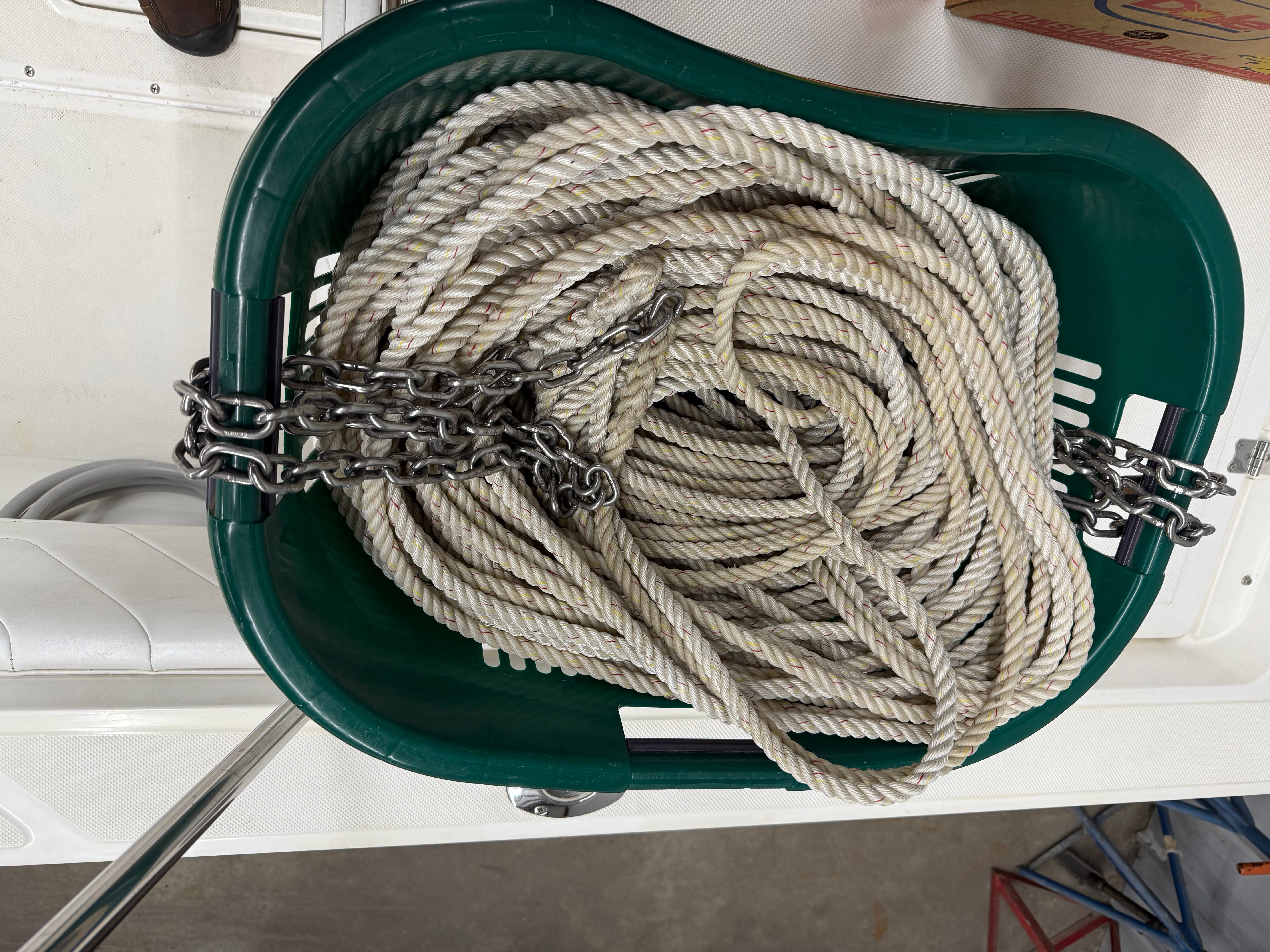Rope and chain in green basket on boat, Fountain 32 Sport Fish Cruiser 1999.