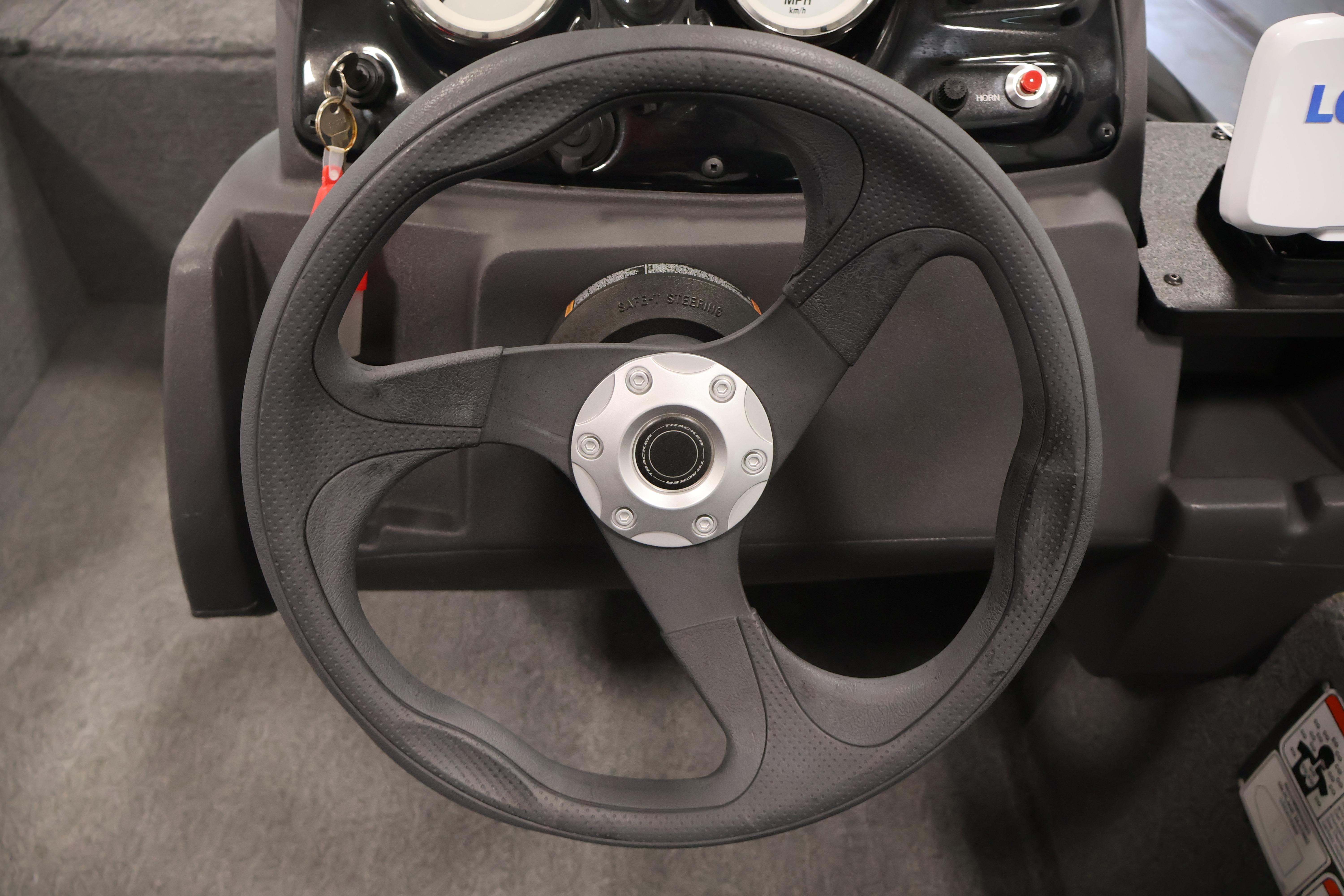 Steering wheel of 2024 Tracker Pro 170 boat, featuring a sleek black design.