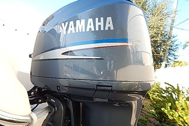 Yamaha outboard motor on a 2003 World Cat 270 EC boat, side view.